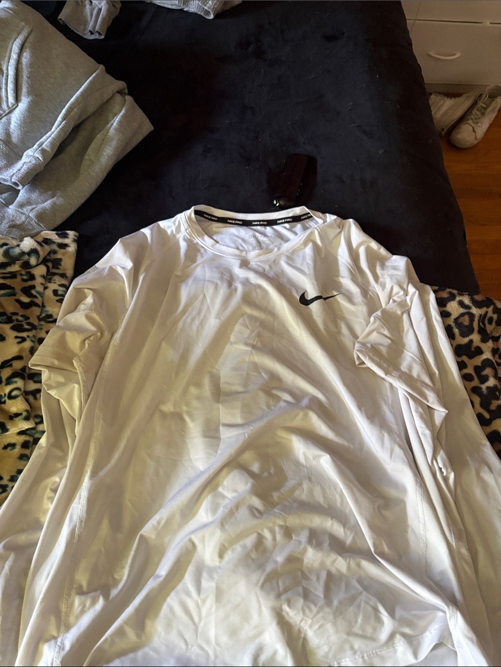 Nike White Long Sleeve Dri-FIT Tee with Black Swoosh